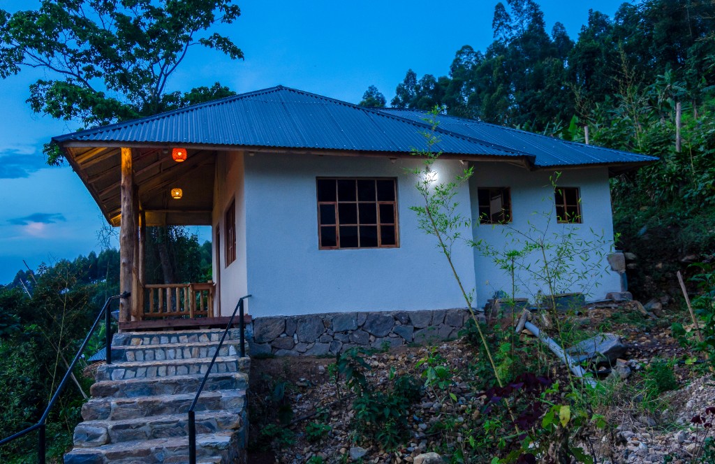 Cottage at dusk with lanterns