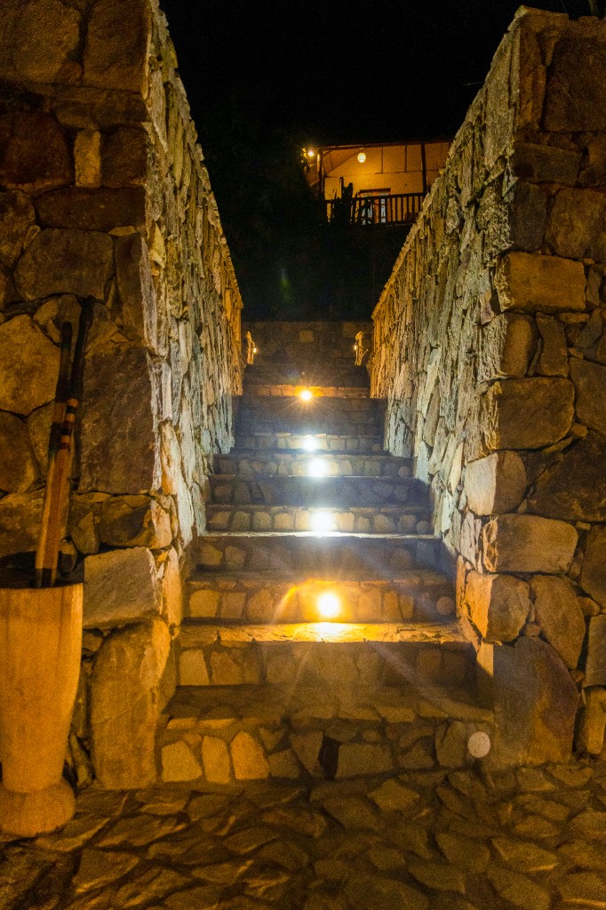 Illuminated stone stairs at night