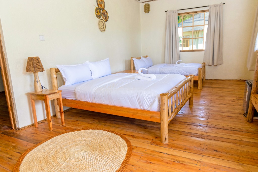 Rustic twin room with woven decor